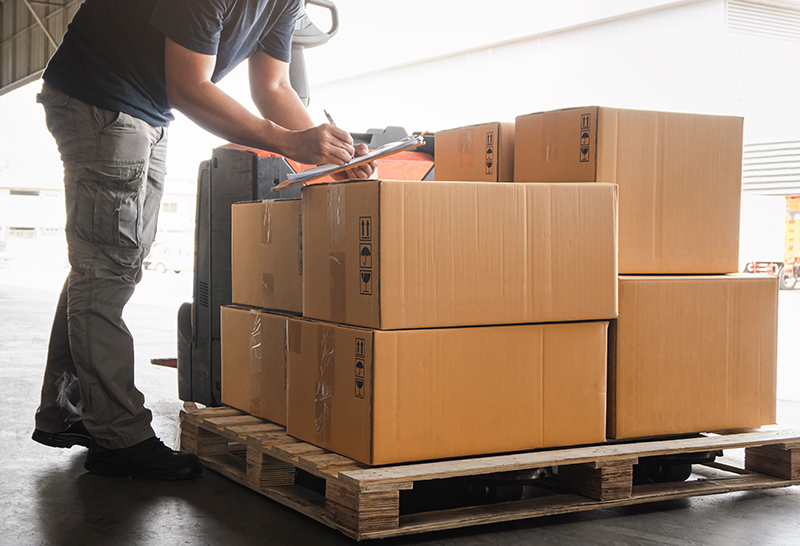 stock image of stacked cardboard boxes